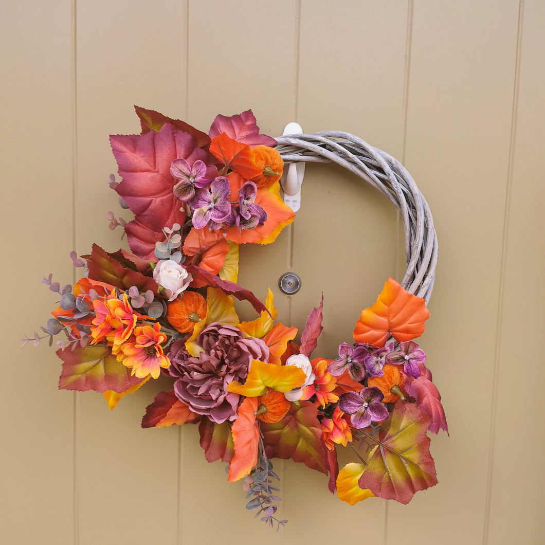 Artificial Autumm flower pumpkin wreath made by Partridge Blooms in Glasgow, Scotland